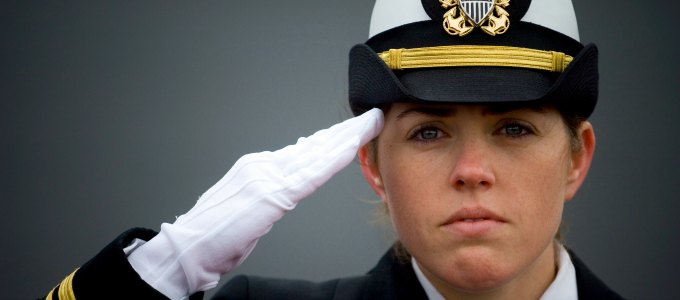 081108-N-5549O-035 MILWAUKEE (Nov. 8, 2008) Ship's Navigator Lt. j.g. Shaina Hayden renders honors to the national anthem during the commissioning ceremony for the littoral combat ship USS Freedom (LCS 1) at Veterans Park in Milwaukee, Wis. Freedom is the first of two littoral combat ships designed to operate in shallow water environments to counter threats in coastal regions. (U. S. Navy photo Mass Communication Specialist 2nd Class Kevin S. O'Brien/Released)