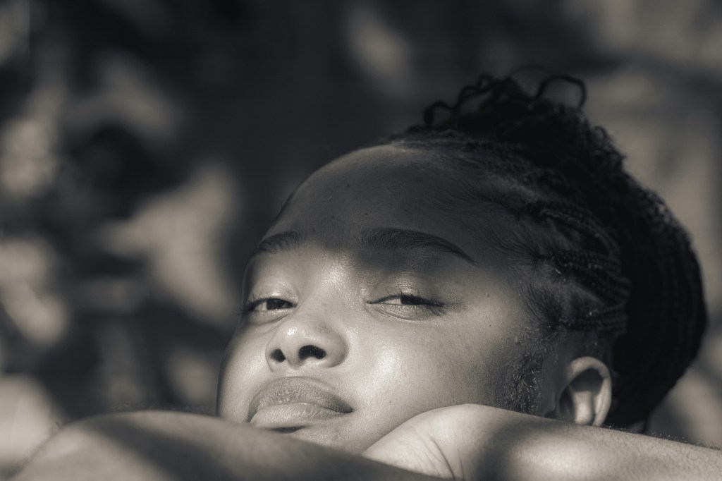 black woman resting and relaxing peaceful